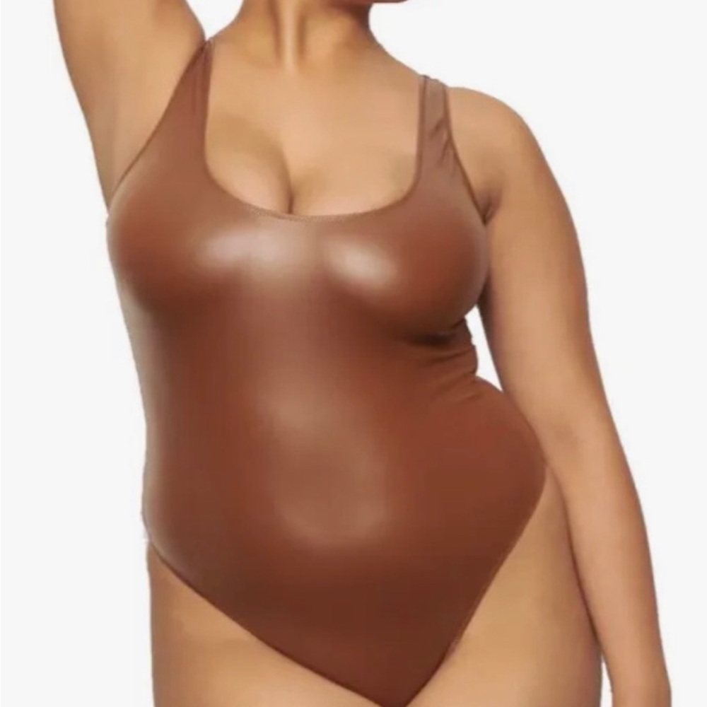 Skims faux leather copper bodysuit